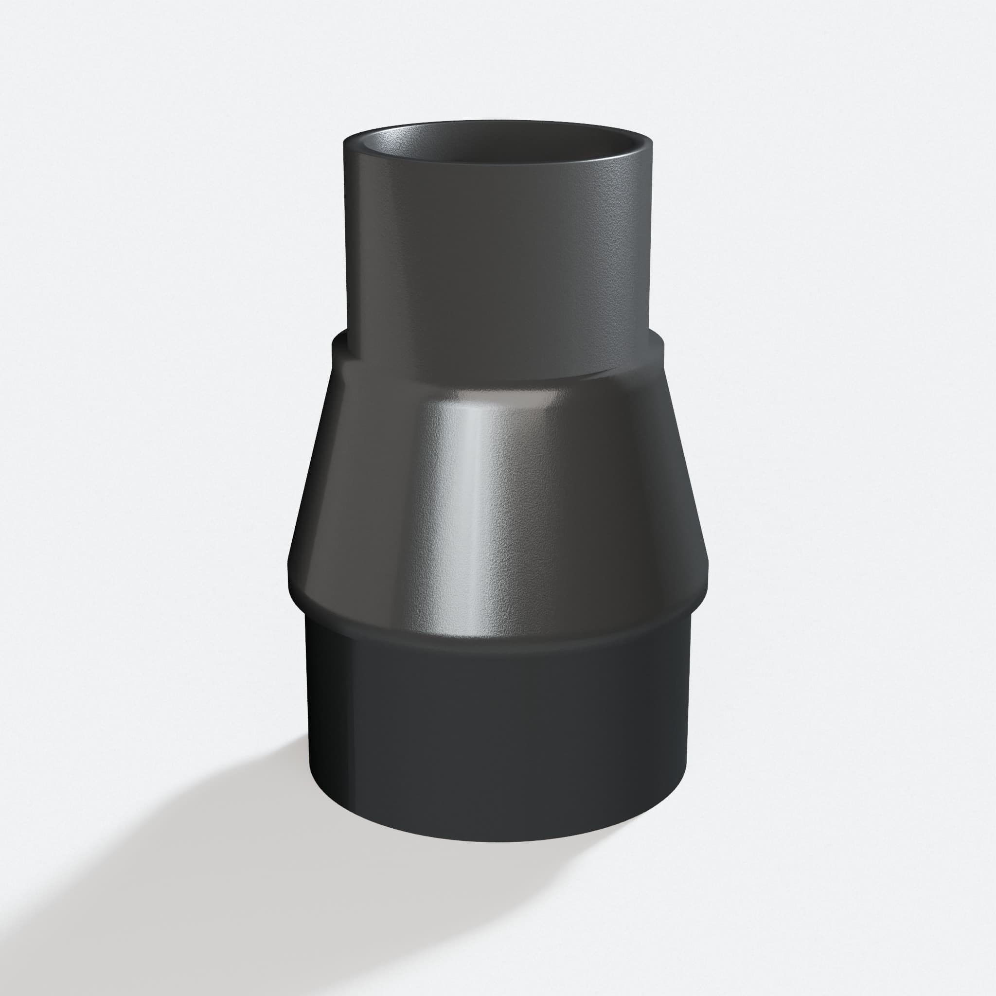 Adapter sized 38.1 mm to 50.8 mm for CMXEMAX69434501, rotated angle showing both stubs