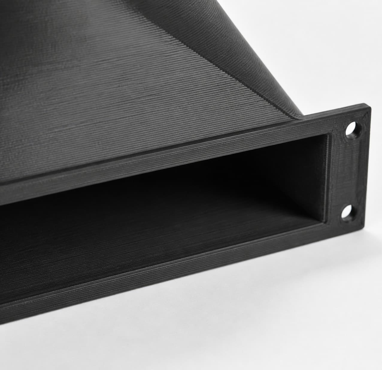 Under-Cabinet Floor Sweep with 6 inch Duct Connection, close view of the printed surface