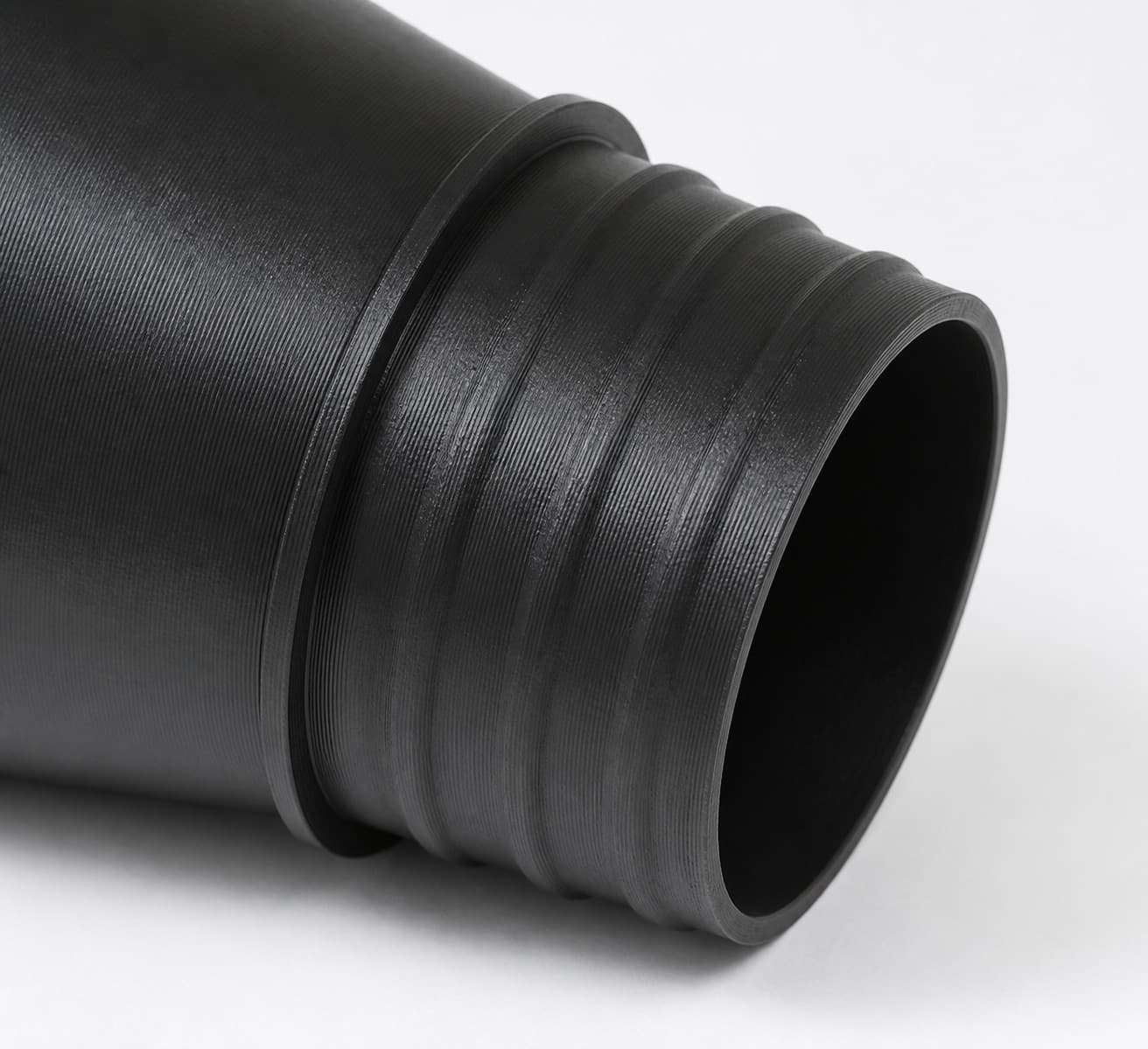 2-1/2 inch Corrugated Hose to 3 inch Smooth Duct Adapter, close view of the printed surface