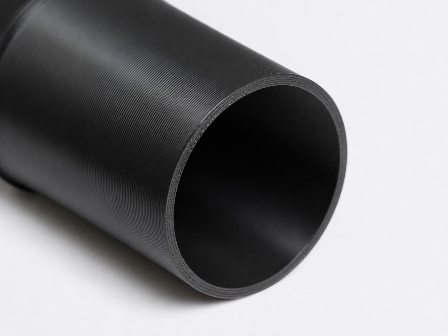 1-1/2 inch Wire Reinforced Hose to 1-1/4 inch Smooth Duct Adapter, close view of the printed surface