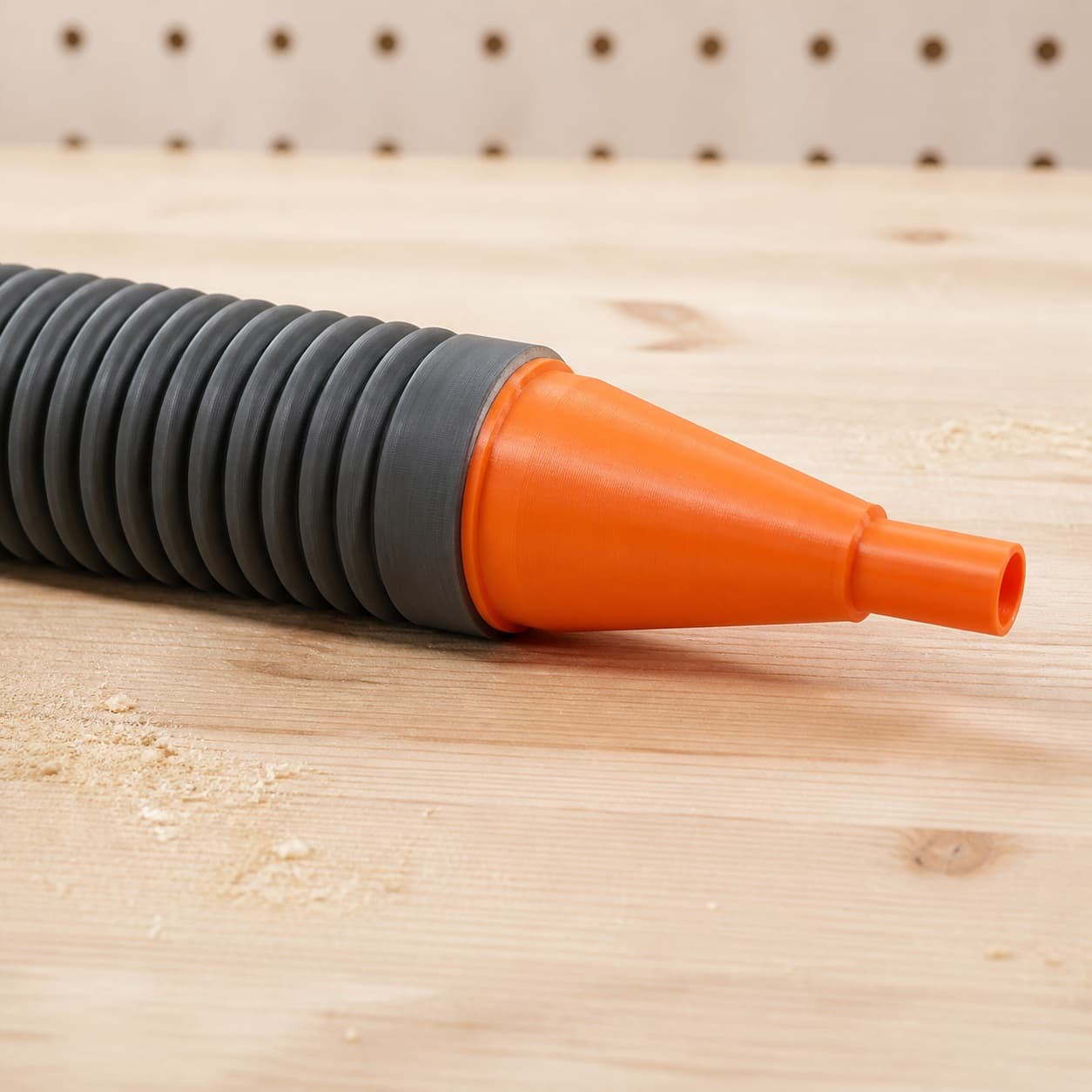 The DBO380 dust adapter connected to a plain shop vac hose