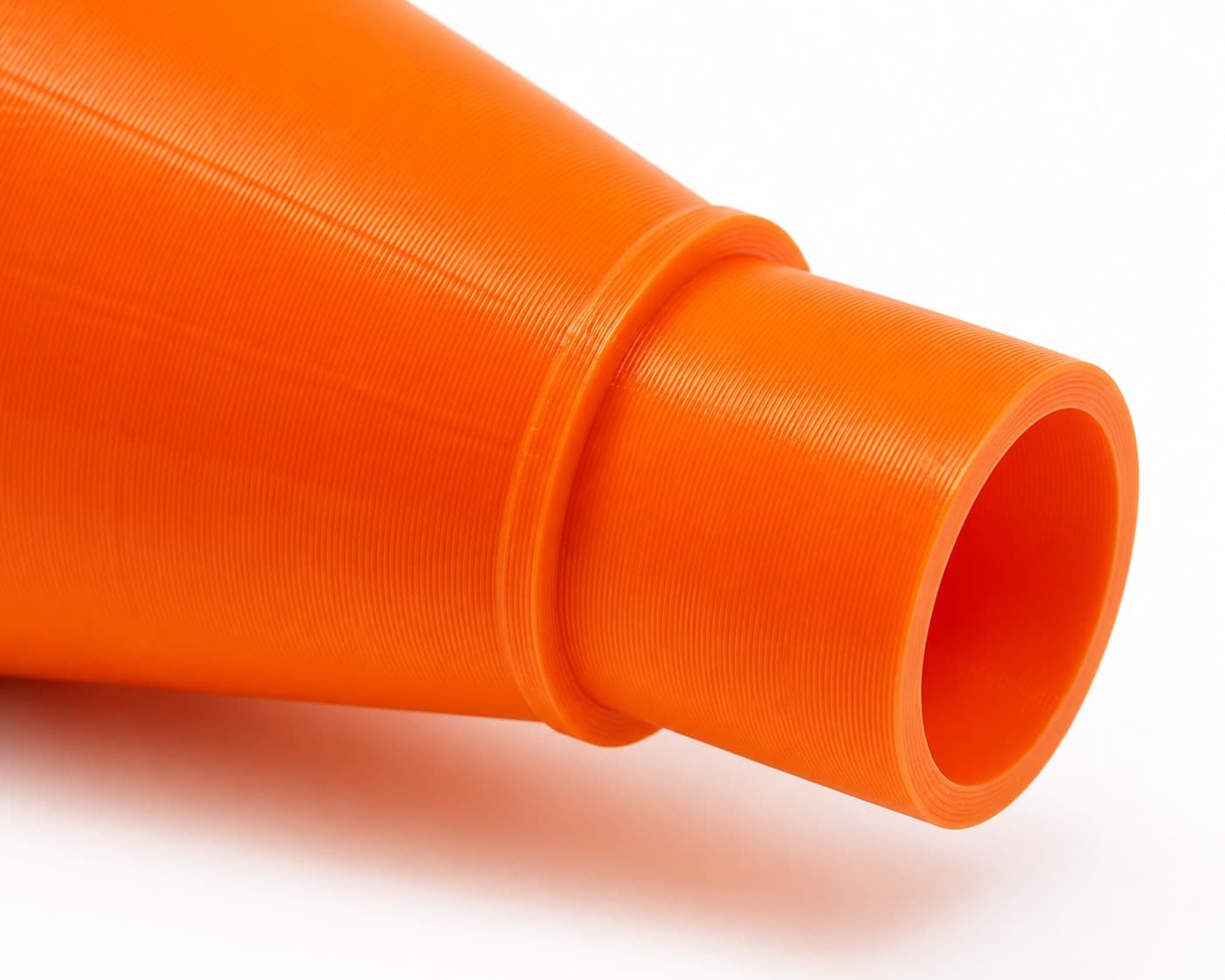 A close view of the dust adapter opening, about 47.6 mm across