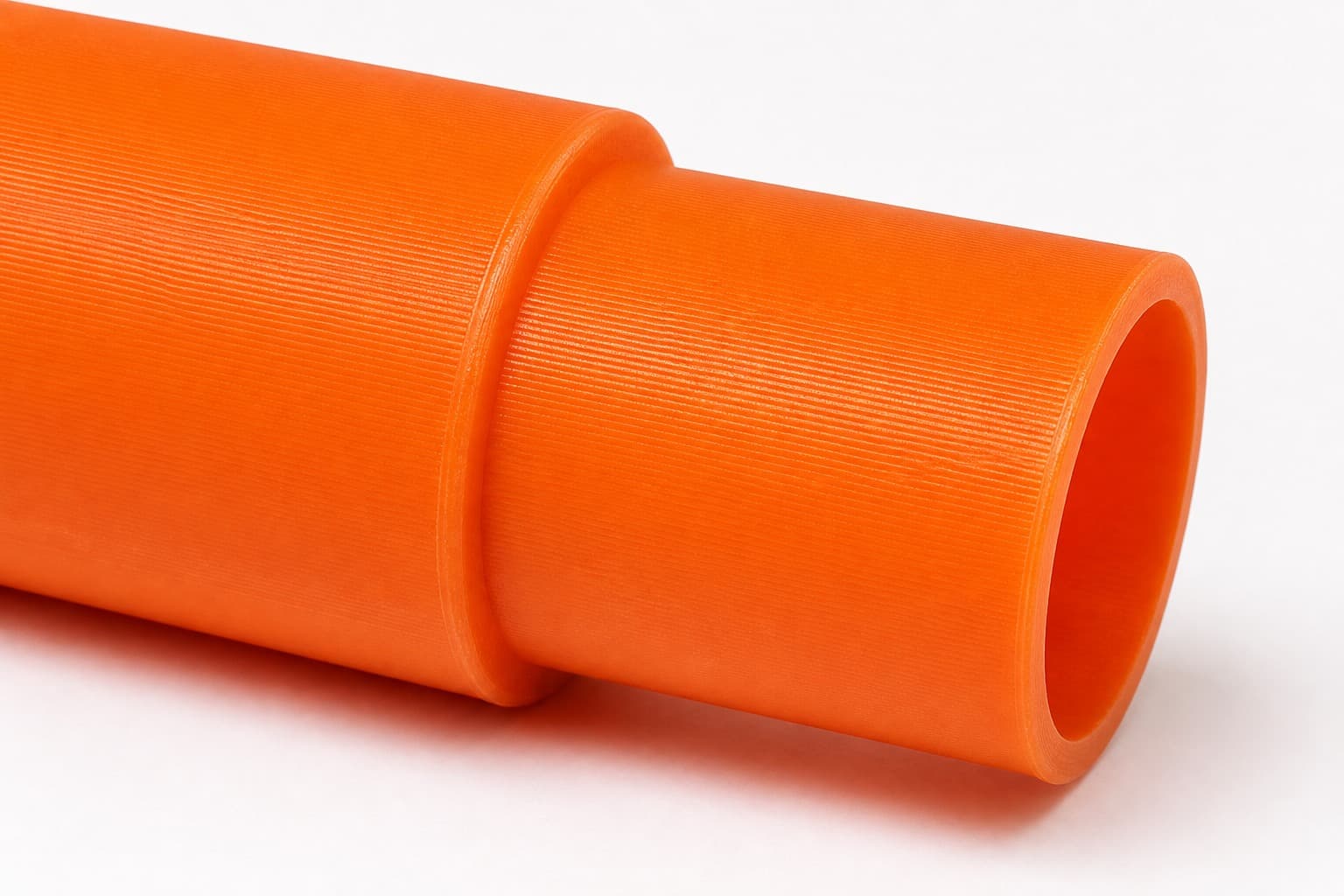 A close view of the dust adapter opening, about 27 mm across