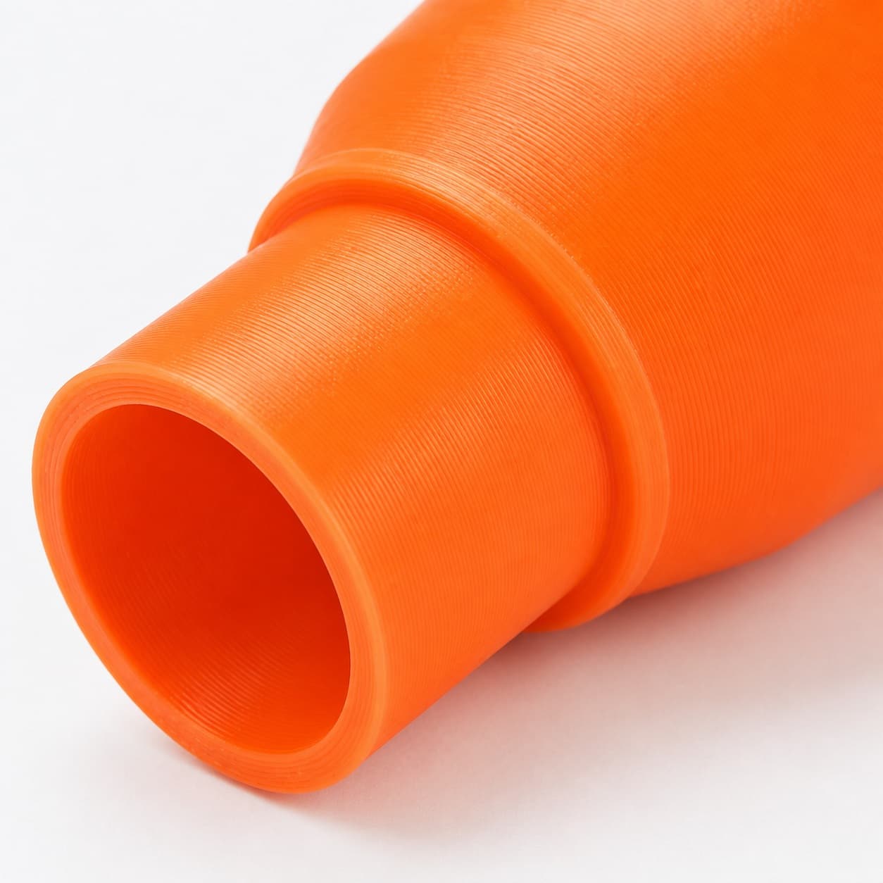 A close view of the dust adapter opening, about 47.6 mm across