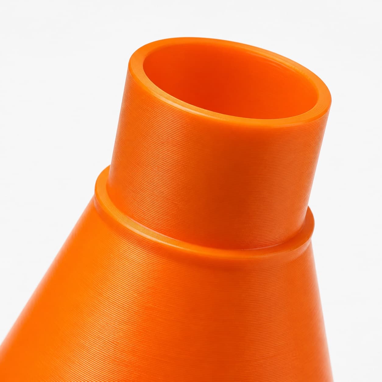 A close view of the dust adapter opening, about 50.8 mm across