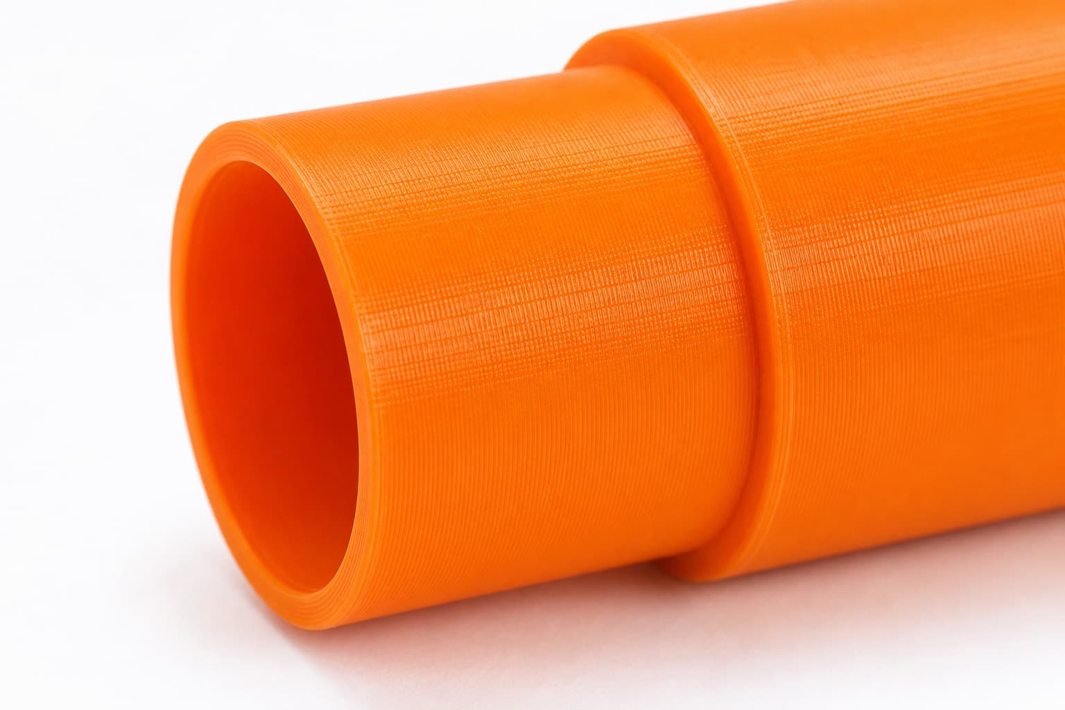 A close view of the dust adapter opening, about 31.75 mm across