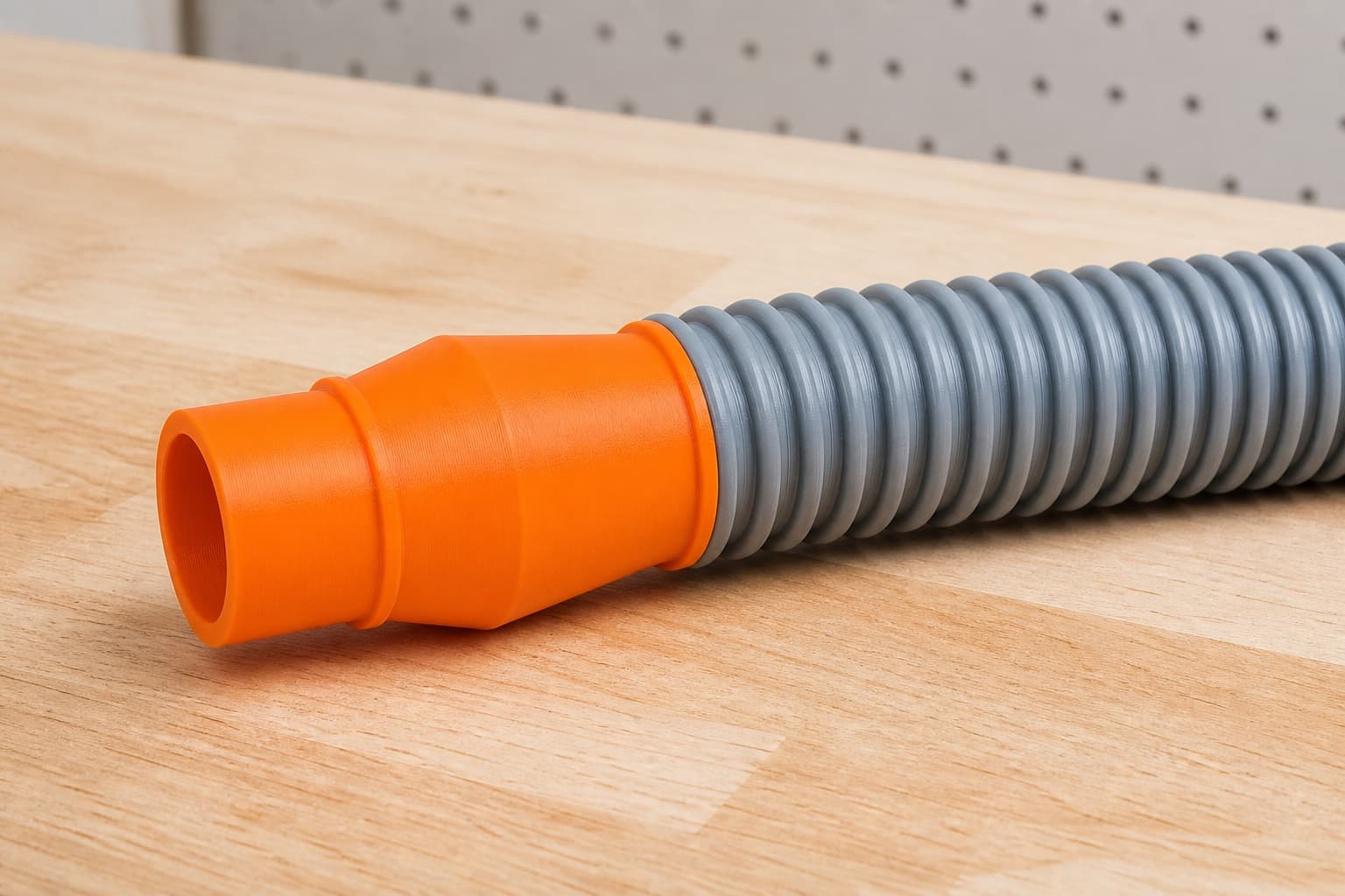 The MultiMaster dust adapter connected to a plain shop vac hose