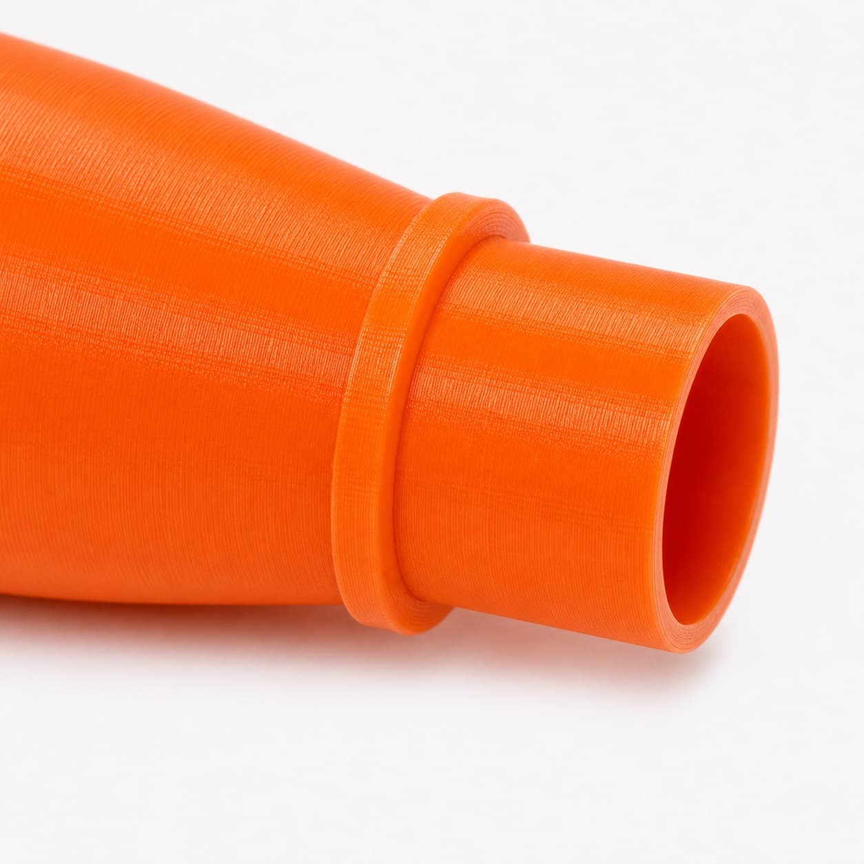 A close view of the dust adapter opening, about 27 mm across