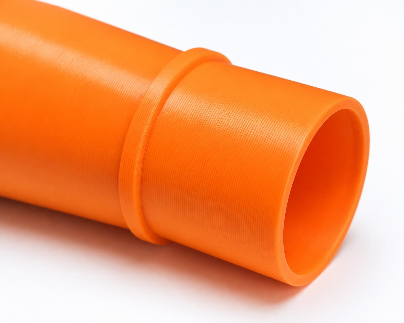 A close view of the dust adapter opening, about 31.75 mm across