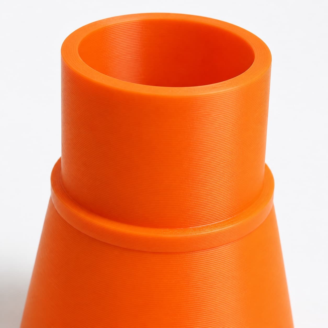 A close view of the dust adapter opening, about 57.15 mm across