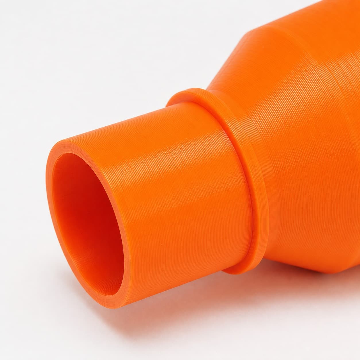 A close view of the dust adapter opening, about 57.15 mm across
