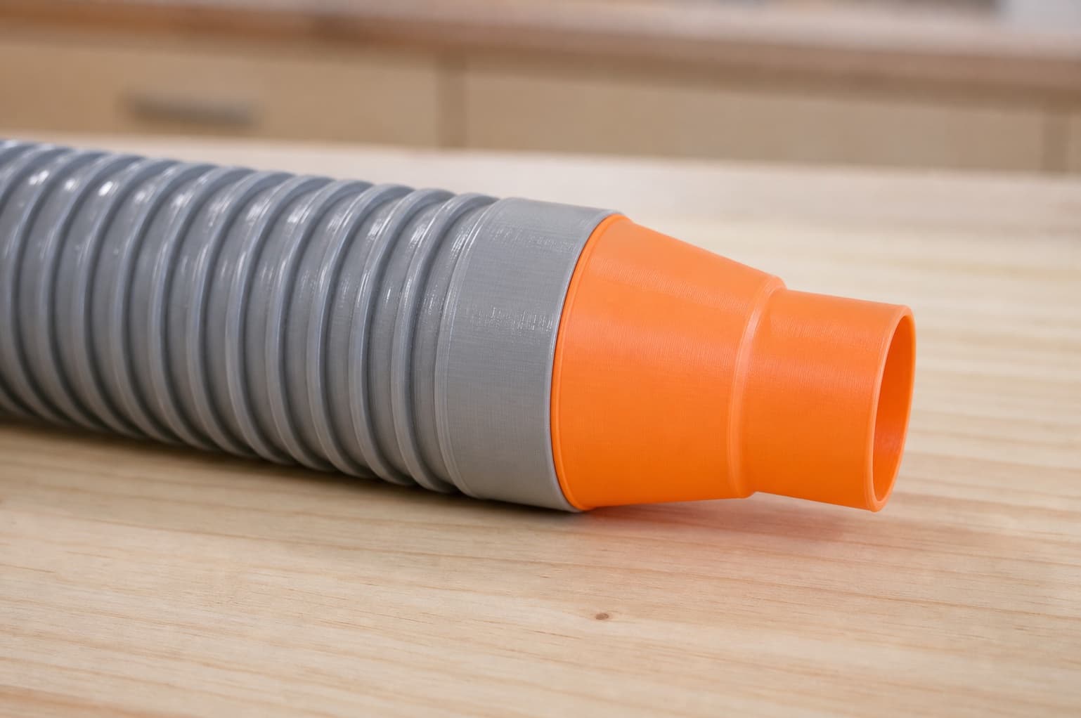 The DWE6423K dust adapter connected to a plain shop vac hose