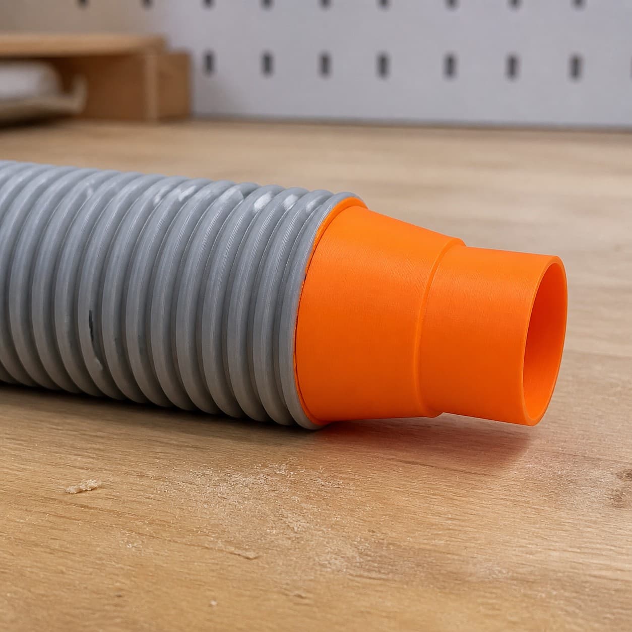 The GCM12SD dust adapter connected to a plain shop vac hose