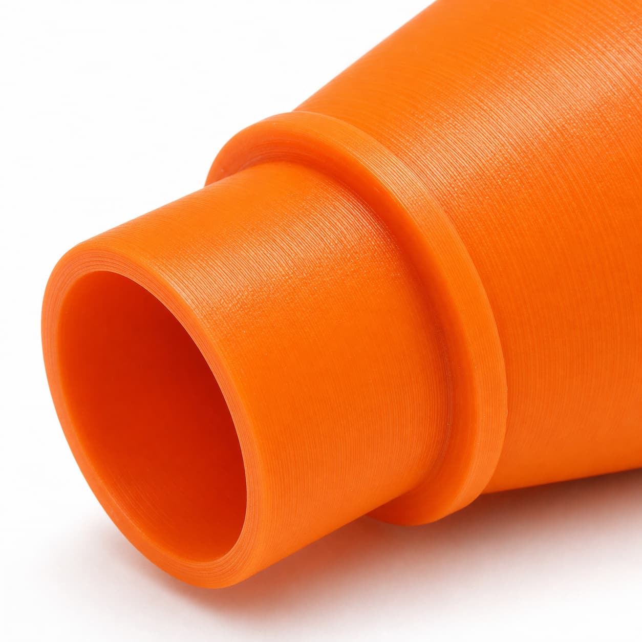 A close view of the dust adapter opening, about 35 mm across