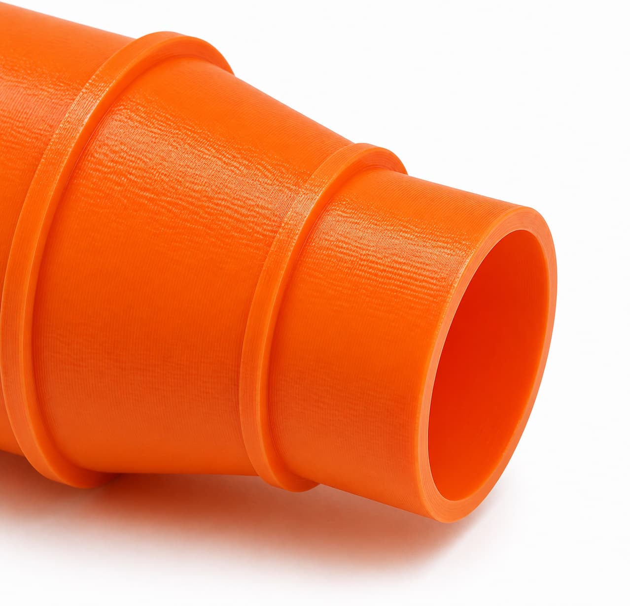 A close view of the dust adapter opening, about 57.15 mm across