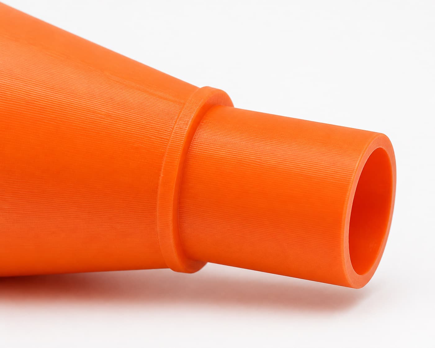 A close view of the dust adapter opening, about 27 mm across