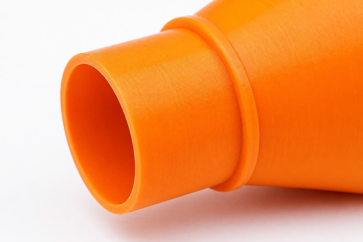 A close view of the dust adapter opening, about 36 mm across