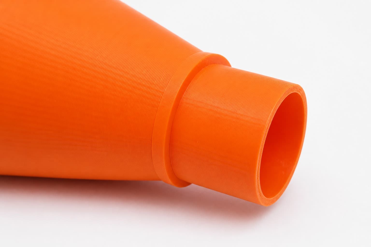 A close view of the dust adapter opening, about 47.6 mm across